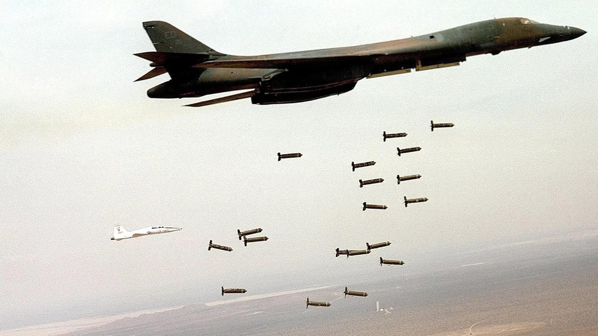 US B1 bomber dropping cluster bombs.