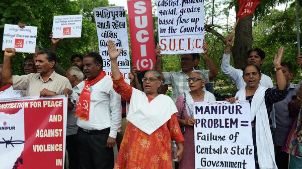 Activists and supporters of the Social Unity Centre of India (Communist), CPI (M) and others protest in solidarity with the people of India’s north-eastern state of Manipur amid ongoing ethnic violence, in Ahmedabad on June 30, 2023. - Sputnik भारत