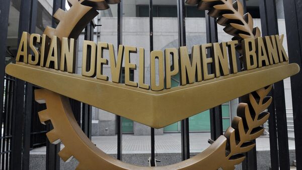 In this file photo taken on September 2, 2010, a picture of the logo of the Asian Development Bank (ADB) displayed outside its headquarters in Manila.  - Sputnik भारत