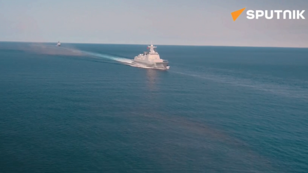 Sailors of the Russian Navy and the Chinese Navy perform joint artillery firing at the North/Interaction - 2023 joint naval exercise - Sputnik भारत