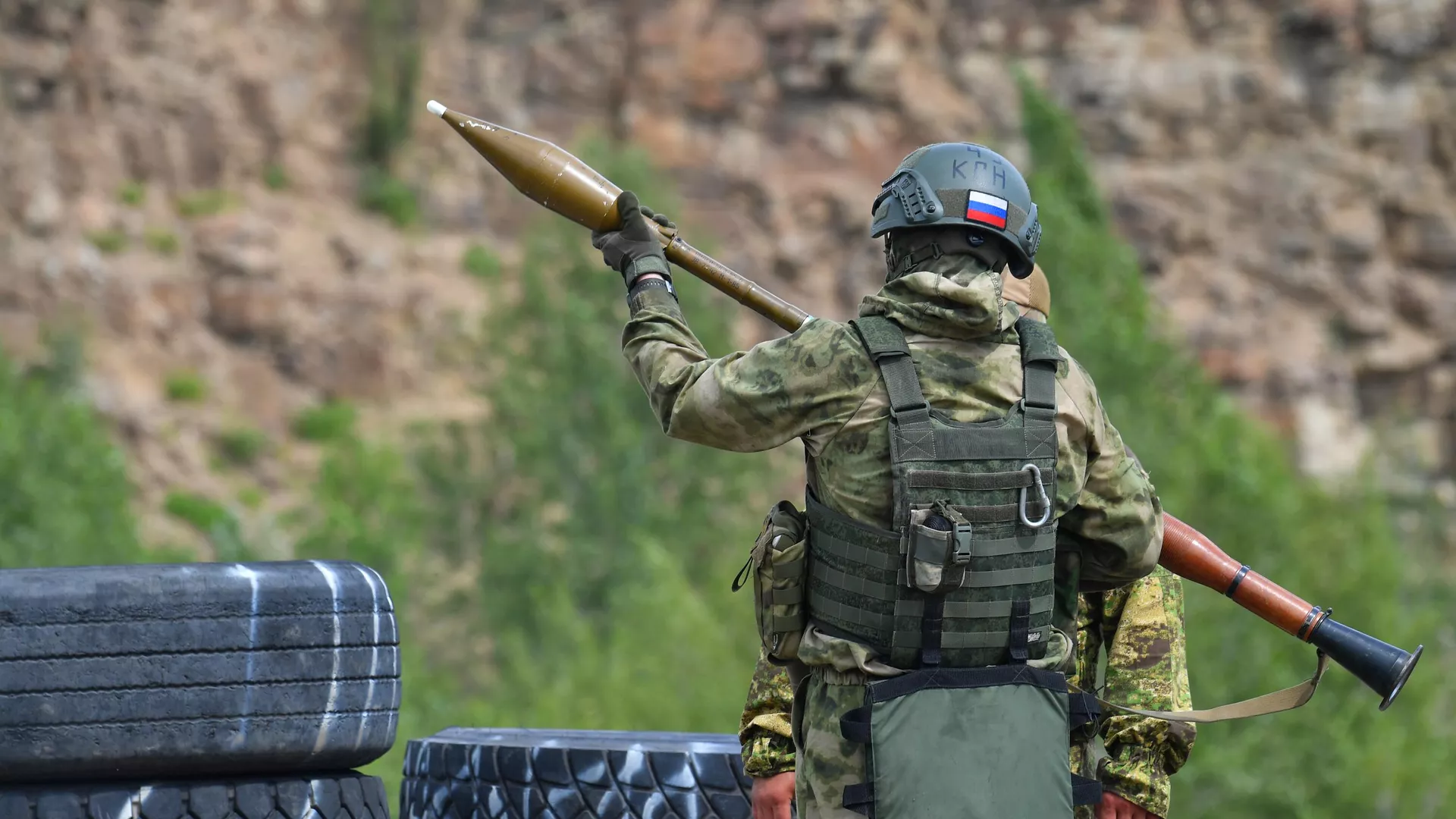 A Russian serviceman prepares to fire a grenade launcher during an intensive training of scouts of the Yug group of forces at a training ground, as Russia's military operation in Ukraine continues, in Donetsk People's Republic, Russia.