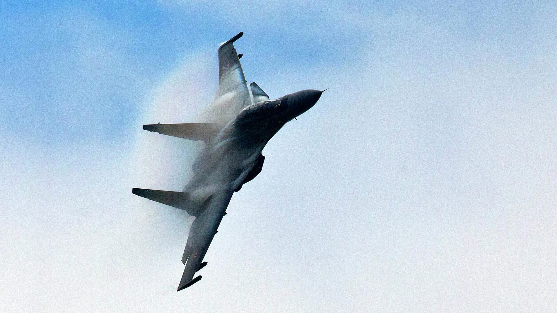 A Sukhoi SU-30 displays its skills during an air show ahead of the anniversary of Indian Air Force and the diamond jubilee celebration of the Tezpur Air Force Station in Tezpur, India, Thursday, Sept. 26, 2019 - Sputnik India, 1920, 22.08.2023