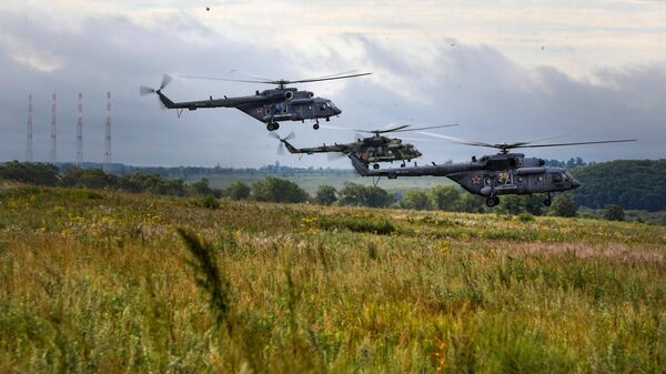 Multi-purpose Mi-8 helicopters at the strategic command and staff at the 'Vostok 2022' military maneuvers at the Sergeevsky training ground - Sputnik भारत
