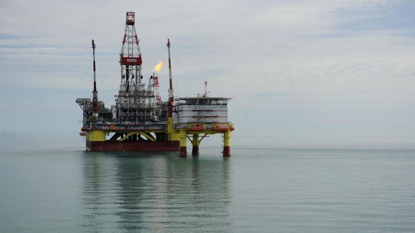 A picture taken on April 10, 2011 shows the Russian LUKOIL ice-resistant fixed platform LSP-1, built at the Astrakhansky Korabel shipyard, intended to drill and operate wells and collect and pre-treat reservoir content at Korchagin's oil field in the Russian sector of the Caspian Sea some 180 km outside Astrakhan. - Sputnik India