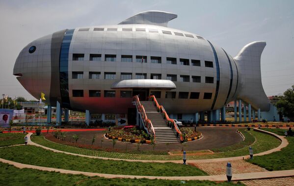 An Indian man walks in front of the newly opened National Fisheries Development Board (NFDB) building, designed to resemble a fish, in Hyderabad, India, Friday, April 20, 2012. - Sputnik India