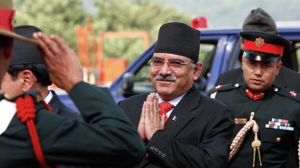 Nepal's Prime Minister Pushpa Kamal Dahal Prachanda, center greets upon his arrival at the airport in Katmandu, Nepal - Sputnik India