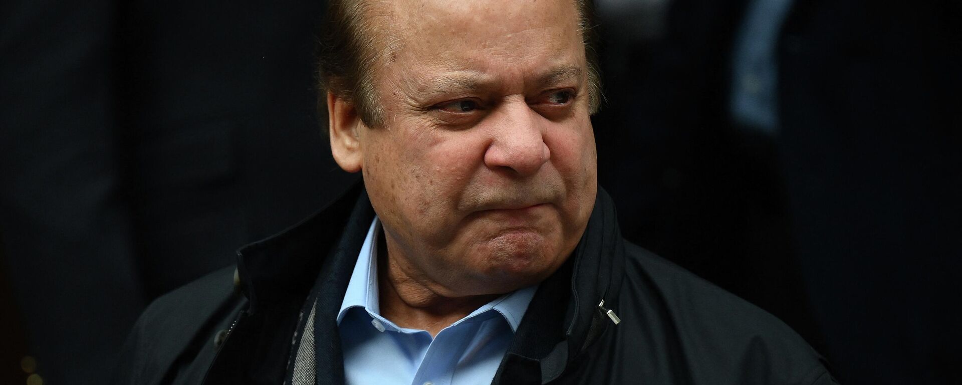Pakistan's former Prime Minister Nawaz Sharif, brother of Pakistan's current Prime Minister Shehbaz Sharif,  leaves from a property in west London on May 11, 2022. - Sputnik भारत, 1920, 07.08.2023