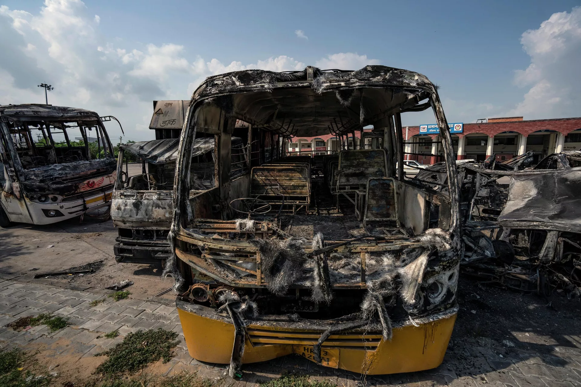 Burnt vehicles stand in a transport yard in Nuh in Haryana state, India, Tuesday, Aug., 1, 2023. Burnt vehicles stand in a transport yard in Nuh in Haryana state, India, Tuesday, Aug., 1, 2023. - Sputnik India, 1920, 15.08.2023