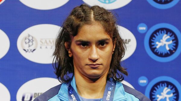Vinesh Phogat of India poses during a medal ceremony as she won the bronze match of the women's 53kg category against Maria Prevolaraki of Greece at the Wrestling World Championships in Nur-Sultan, Kazakhstan - Sputnik India