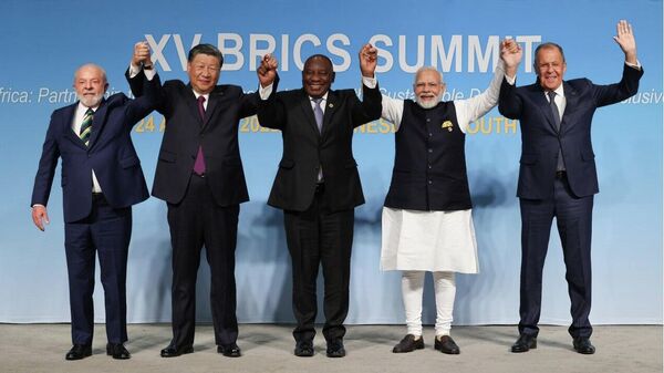 Heads of the BRICS nations' delegations show the BRICS spirit during the traditional photo ceremony - Sputnik India