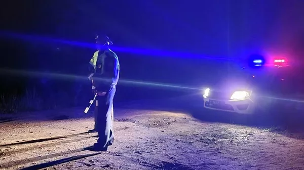 Police officers at the crash site of an Embraer Legacy private jet near the village of Kuzhenkino, Bologovsky District, Tver Region. The list of passengers includes the name and surname of Evgeny Prigozhin, the head of the Wagner Group. According to preliminary data, all people on board died. - Sputnik भारत