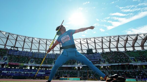 Neeraj Chopra, of India, competes in qualifications for the men's javelin throw at the World Athletics Championships on Thursday, July 21, 2022, in Eugene, Ore. - Sputnik India