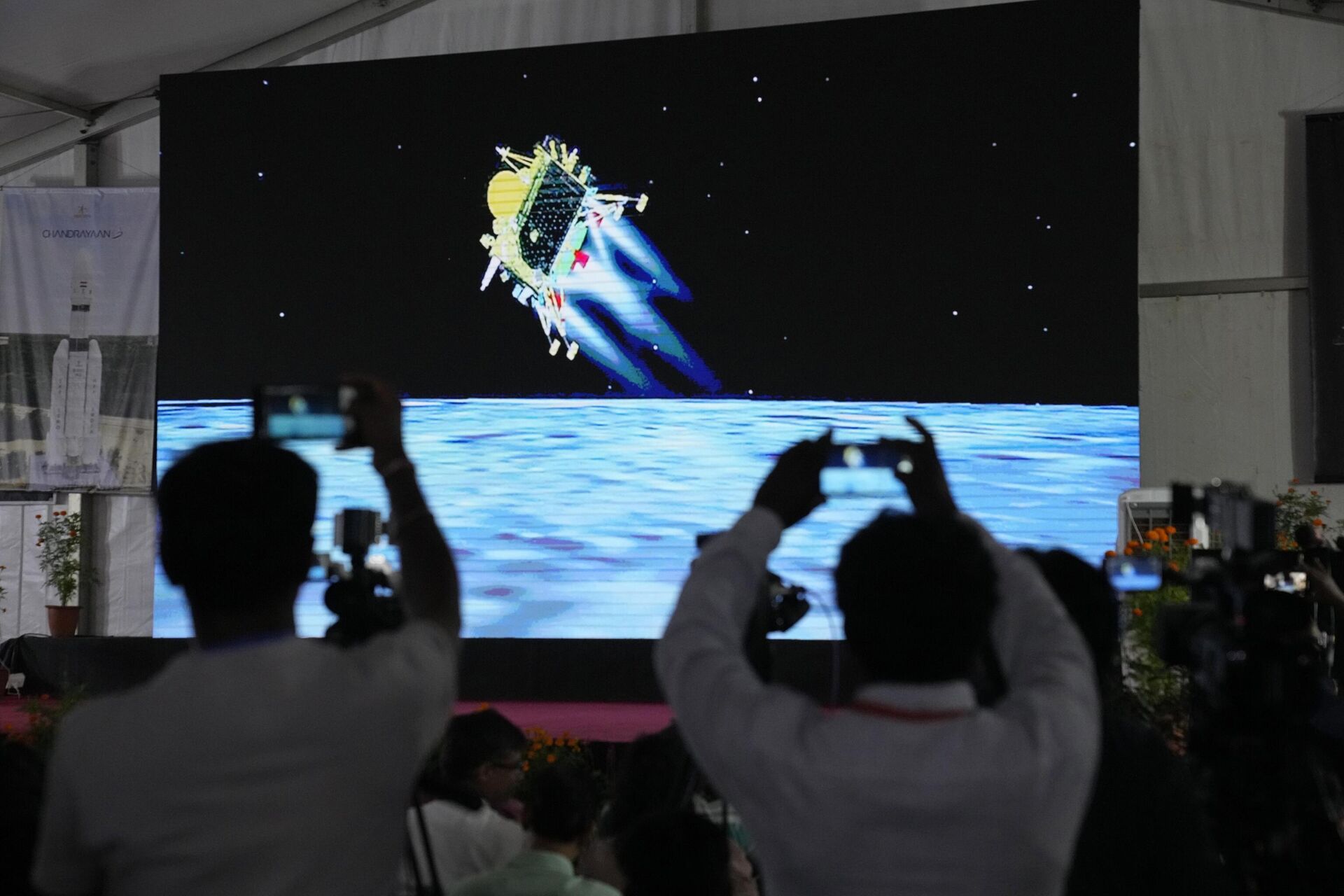 Journalists film the live telecast of spacecraft Chandrayaan-3 landing on the moon at ISRO's Telemetry, Tracking and Command Network facility in Bengaluru, India, Wednesday, Aug. 23, 2023. - Sputnik India, 1920, 09.01.2024
