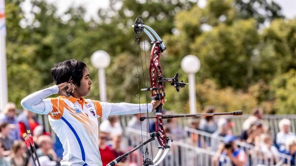 India's Aditi Swami performing in the Archery World Championships in Berlin. - Sputnik India