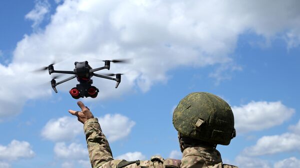 A Russian serviceman is seen using a drone in the special operation zone in Ukraine. File photo - Sputnik भारत