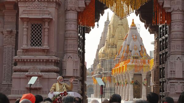 Indian Prime Minister Narendra Modi, speaks during the inauguration of Kashi Vishwanath Dham Corridor, a promenade that connects the sacred Ganges River with the centuries-old temple dedicated to Lord Shiva in Varanasi. - Sputnik India