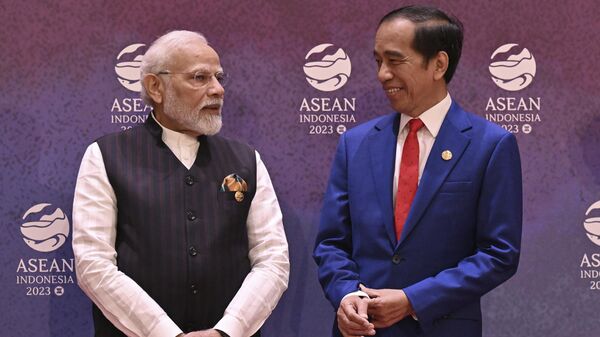 Indian Prime Minister Narendra Modi, left, talks with Indonesian President Joko Widodo during the Association of the Southeast Asian Nations (ASEAN)-India Summit in Jakarta, Indonesia, Thursday, Sept. 7, 2023.  - Sputnik India