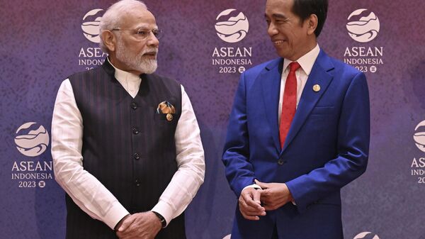 Indian Prime Minister Narendra Modi, left, talks with Indonesian President Joko Widodo during the Association of the Southeast Asian Nations (ASEAN)-India Summit in Jakarta, Indonesia, Thursday, Sept. 7, 2023.  - Sputnik India