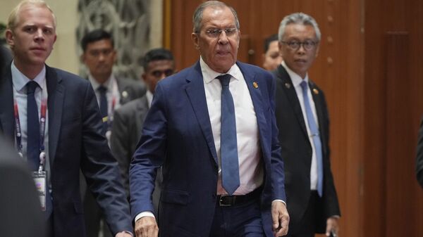 Russian Foreign Minister Sergey Lavrov, center, leaves after attending the East Asia Summit at the Association of Southeast Asian Nations (ASEAN) Summit in Jakarta, Indonesia, Thursday, Sept. 7, 2023. - Sputnik भारत