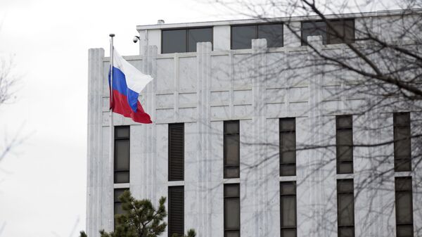 The Russian flag flies over the Russian embassy in Washington, Saturday, March 1, 2014 - Sputnik भारत