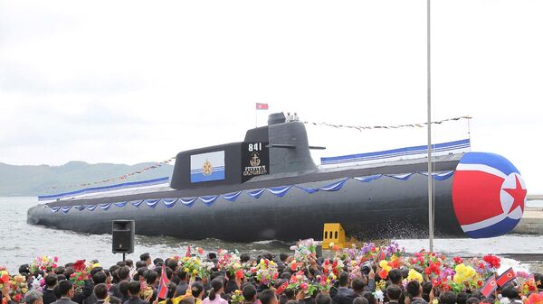 Церемония спуска новой подводной лодки КНДР с тактическими ядерными наступательными вооружениями - Sputnik भारत