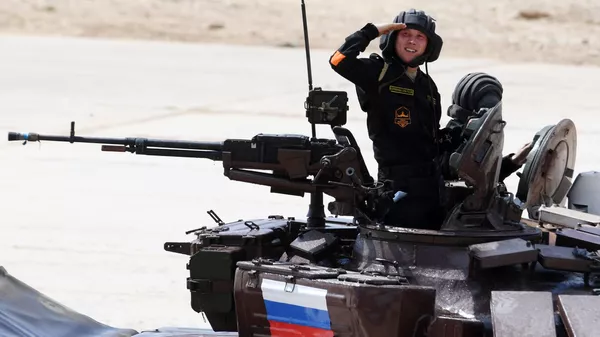 Russian Army team members take part in the tank biathlon individual race during the 2017 International Army Games at the Alabino training center in the Moscow Region - Sputnik भारत