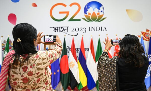 नई दिल्ली में G-20 अंतरराष्ट्रीय मीडिया केंद्र में पत्रकार।  - Sputnik भारत