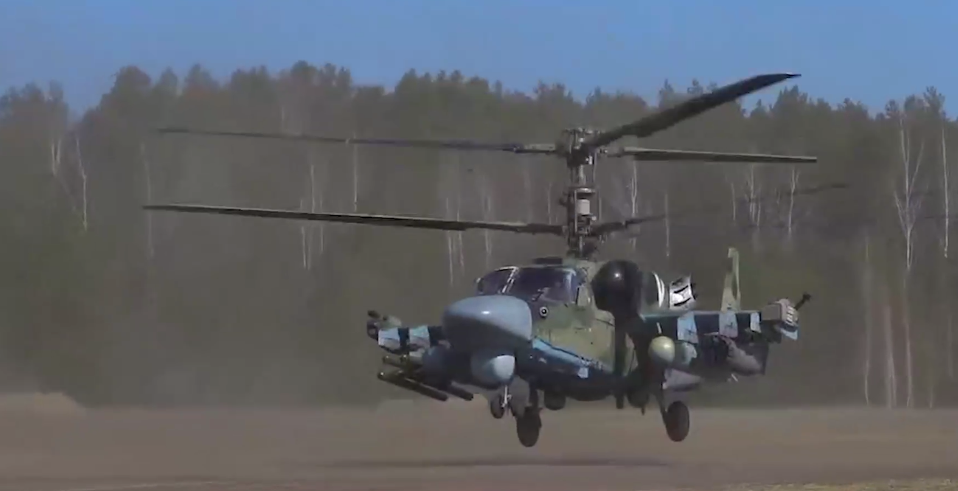 A screenshot of a video depicting a Ka-52 attack helicopter hitting Ukrainian positions. - Sputnik भारत, 1920, 15.09.2023