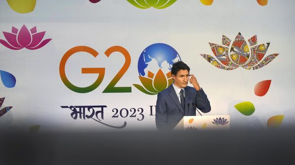 Canada Prime Minister Justin Trudeau interacts with journalists at the end of the G20 Summit, in New Delhi, India, Sunday, Sept.10, 2023. - Sputnik India