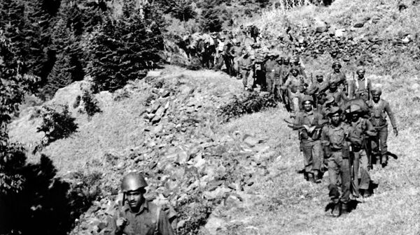 A picture dated September 13, 1965 shows a column of Indian soldiers progressing in the Haji-Pir gorge during the Second Indo-Pakistani War. - Sputnik India