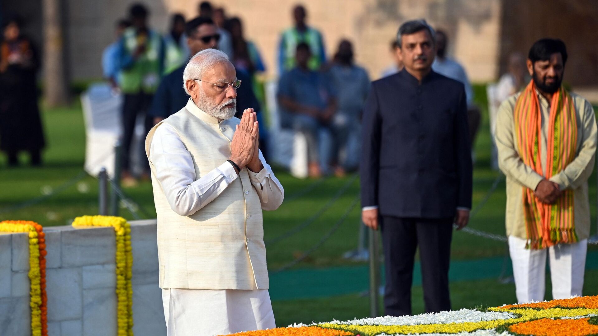 India's Prime Minister Narendra Modi pays respect on the occasion of Mahatma Gandhi's birth anniversary at his memorial in Rajghat, in New Delhi on October 2, 2023.  - Sputnik भारत, 1920, 02.10.2023
