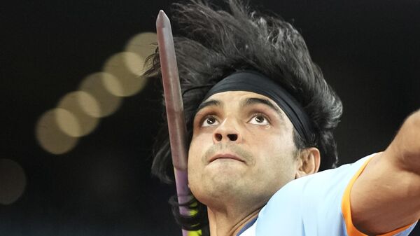 India's Neeraj Chopra competes during the men's javelin throw final at the 19th Asian Games in Hangzhou, China, Wednesday, Oct. 4, 2023. - Sputnik भारत