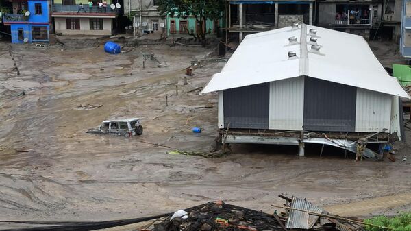 Затопленный наводнением город Рангпо в штате Сикким, Индия - Sputnik भारत