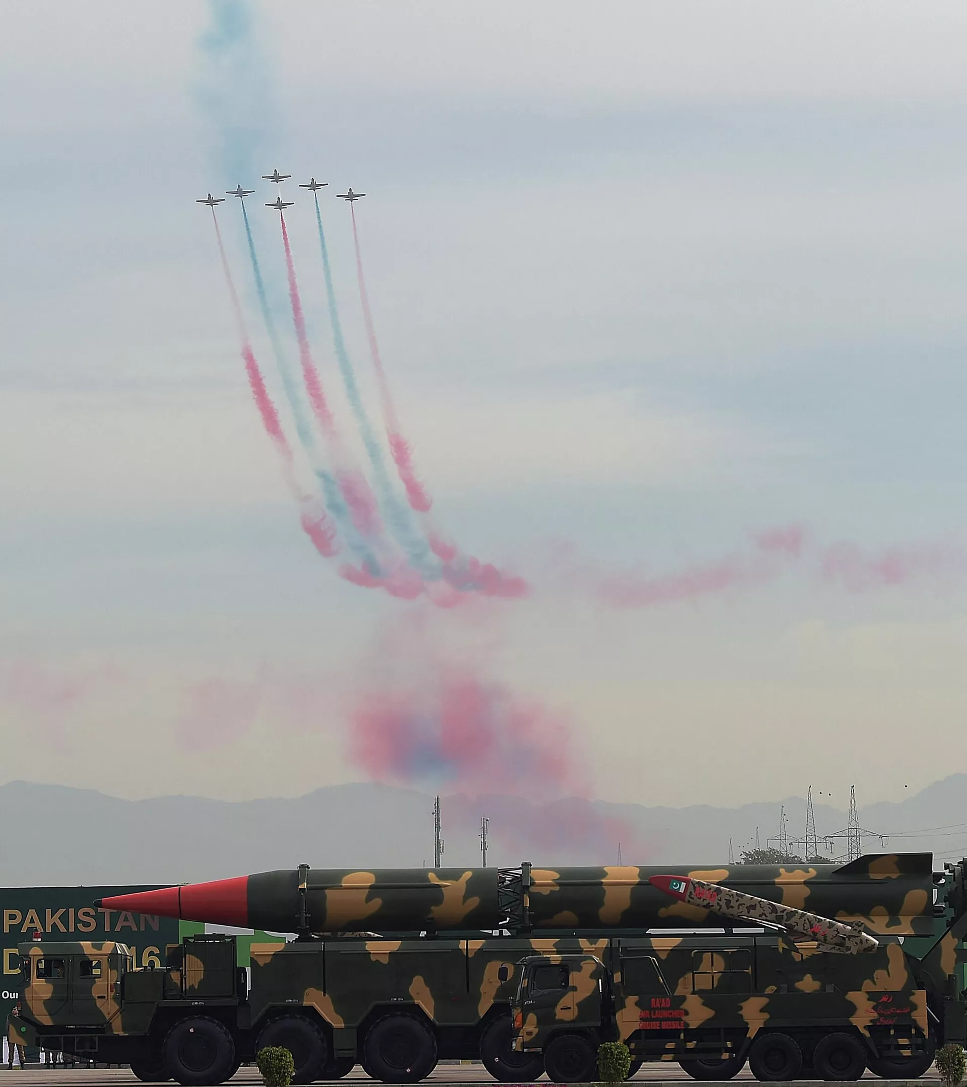 Pakistani jets perform over long-range ballistic Shaheen III missiles during the Pakistan Day military parade in Islamabad on March 23, 2016. Pakistani jets perform over long-range ballistic Shaheen III missiles during the Pakistan Day military parade in Islamabad on March 23, 2016.