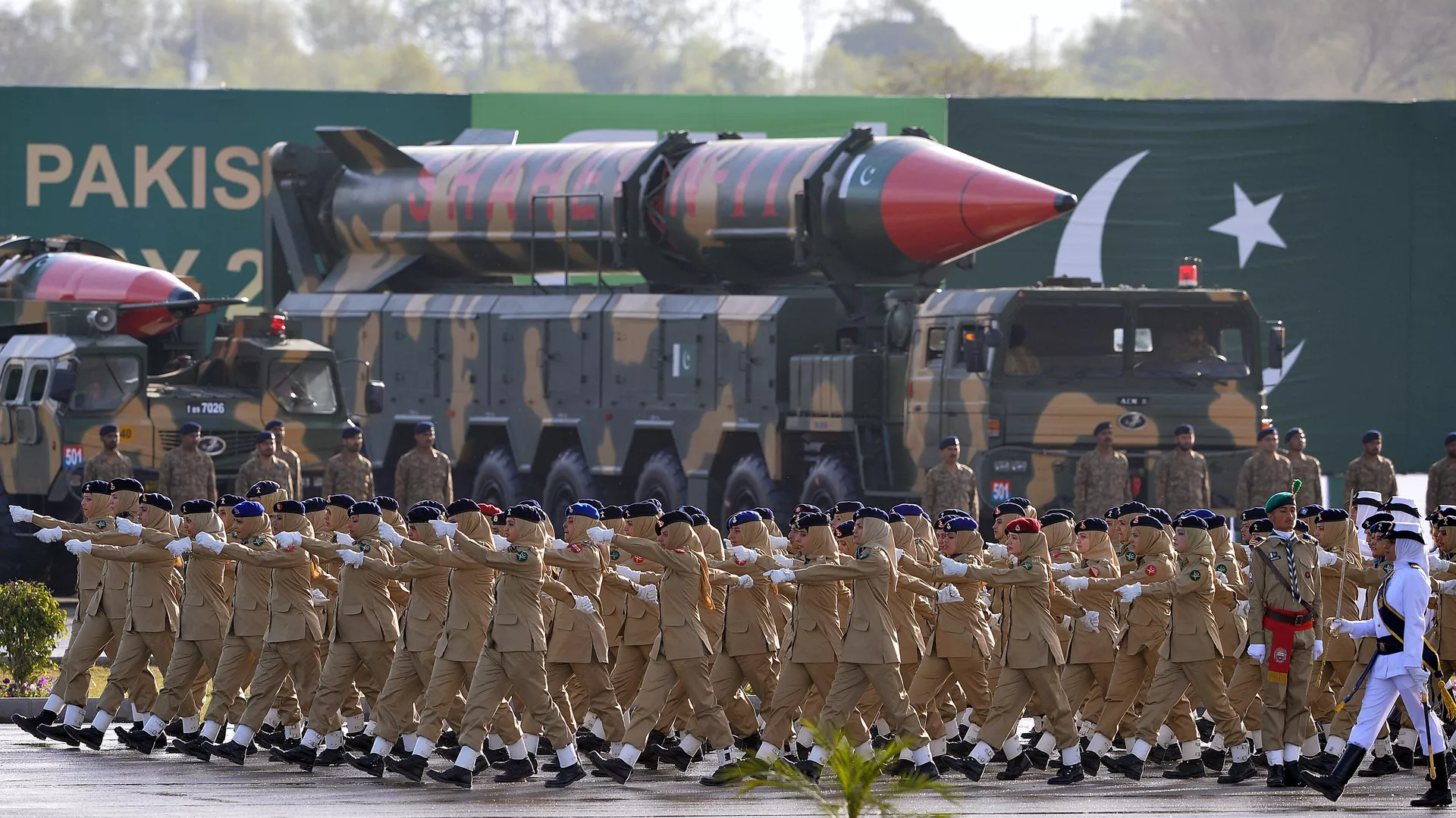 Pakistan Army Medical Corps personnel march past long-range ballistic Shaheen III missiles during the Pakistan Day military parade in Islamabad on March 23, 2016.