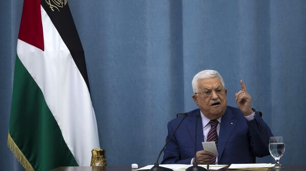 Palestinian President Mahmoud Abbas speaks a meeting of the PLO executive committee and a Fatah Central Committee at the Palestinian Authority headquarters, in the West Bank city of Ramallah, Wednesday, May 12, 2021. - Sputnik भारत