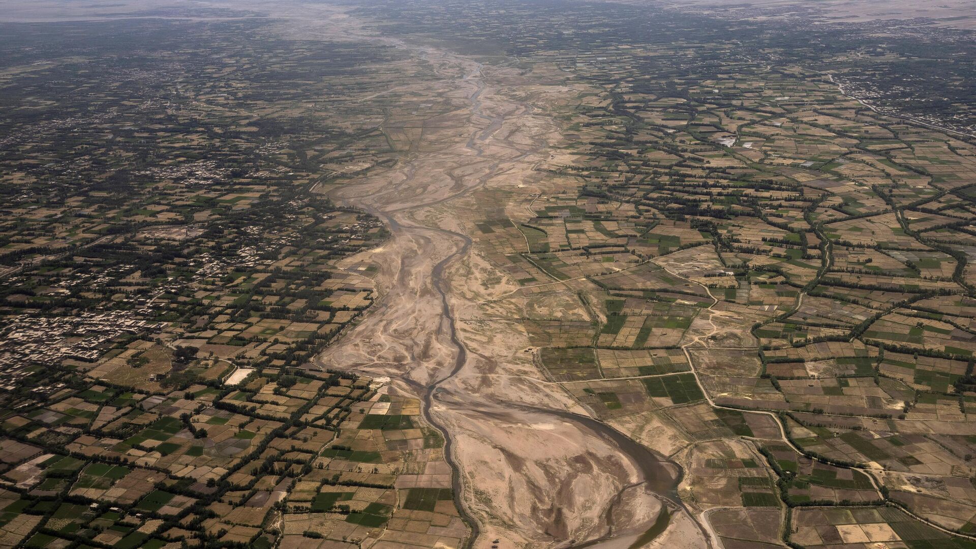 An aerial view of the outskirts of Herat, Afghanistan, Monday, June 5, 2023. Two 6.3 magnitude earthquakes killed dozens of people in western Afghanistan's Herat province on Saturday, Oct. 7, 2023, the country's national disaster authority said. - Sputnik भारत, 1920, 15.10.2023