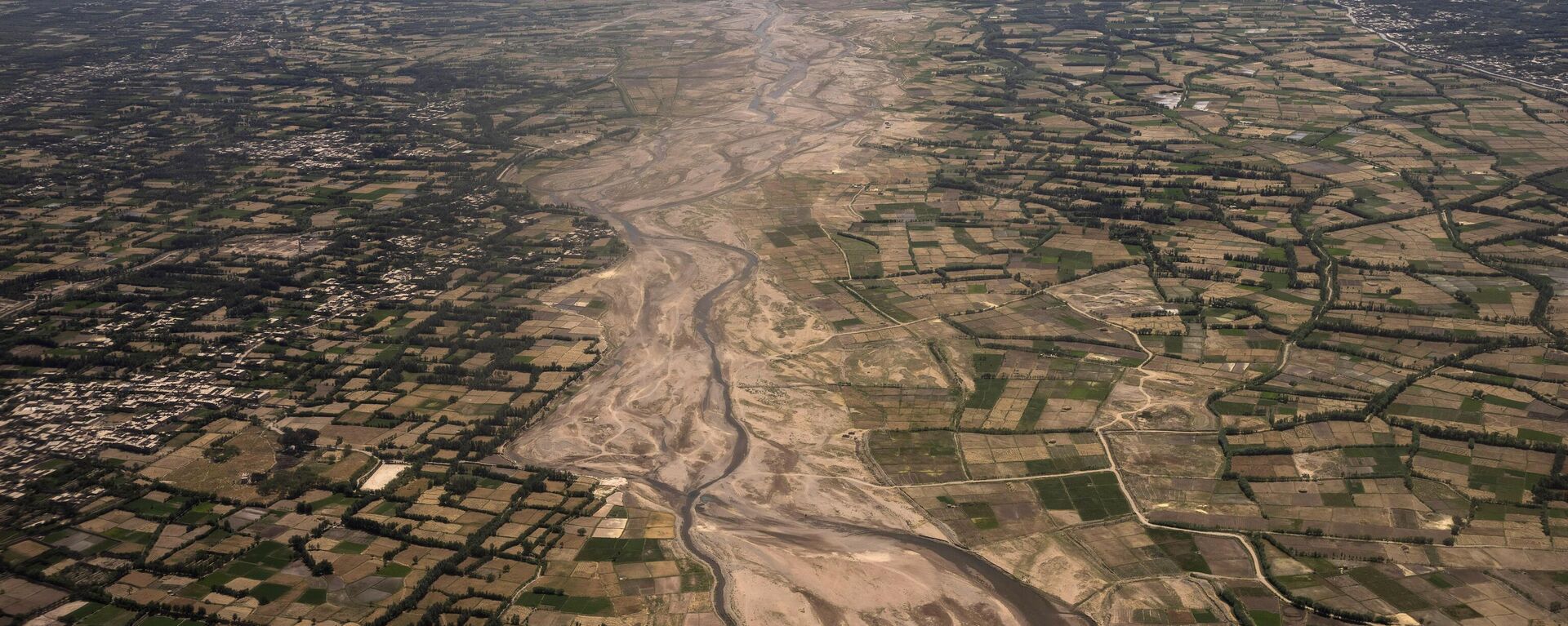 An aerial view of the outskirts of Herat, Afghanistan, Monday, June 5, 2023. Two 6.3 magnitude earthquakes killed dozens of people in western Afghanistan's Herat province on Saturday, Oct. 7, 2023, the country's national disaster authority said. - Sputnik भारत, 1920, 15.10.2023