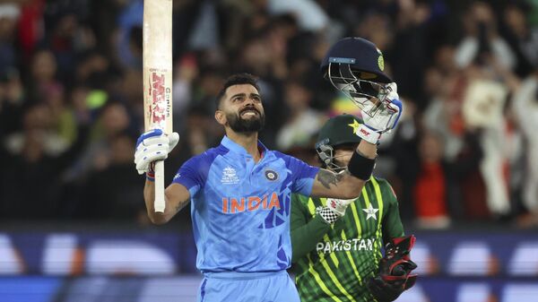 India's Virat Kohli reacts after winning the T20 World Cup cricket match against Pakistan in Melbourne, Australia, Sunday, Oct. 23, 2022.  - Sputnik भारत