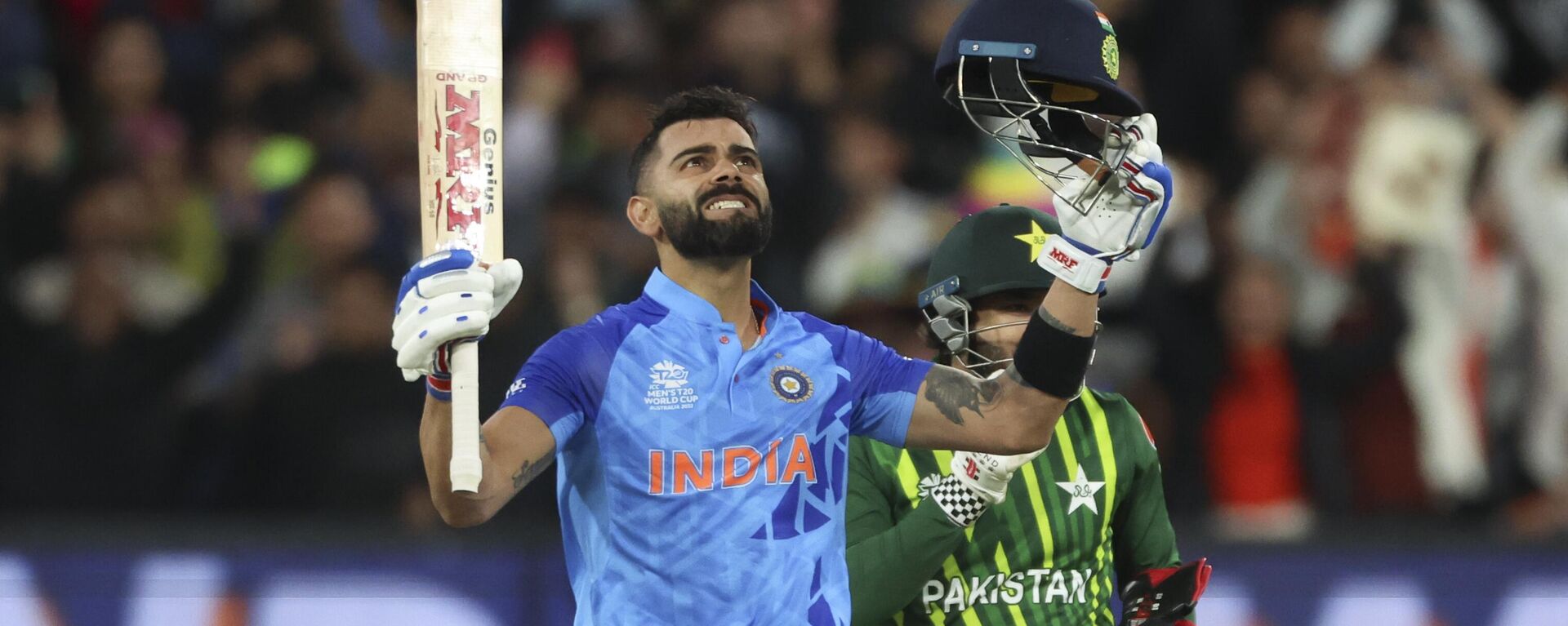 India's Virat Kohli reacts after winning the T20 World Cup cricket match against Pakistan in Melbourne, Australia, Sunday, Oct. 23, 2022.  - Sputnik भारत, 1920, 05.11.2023