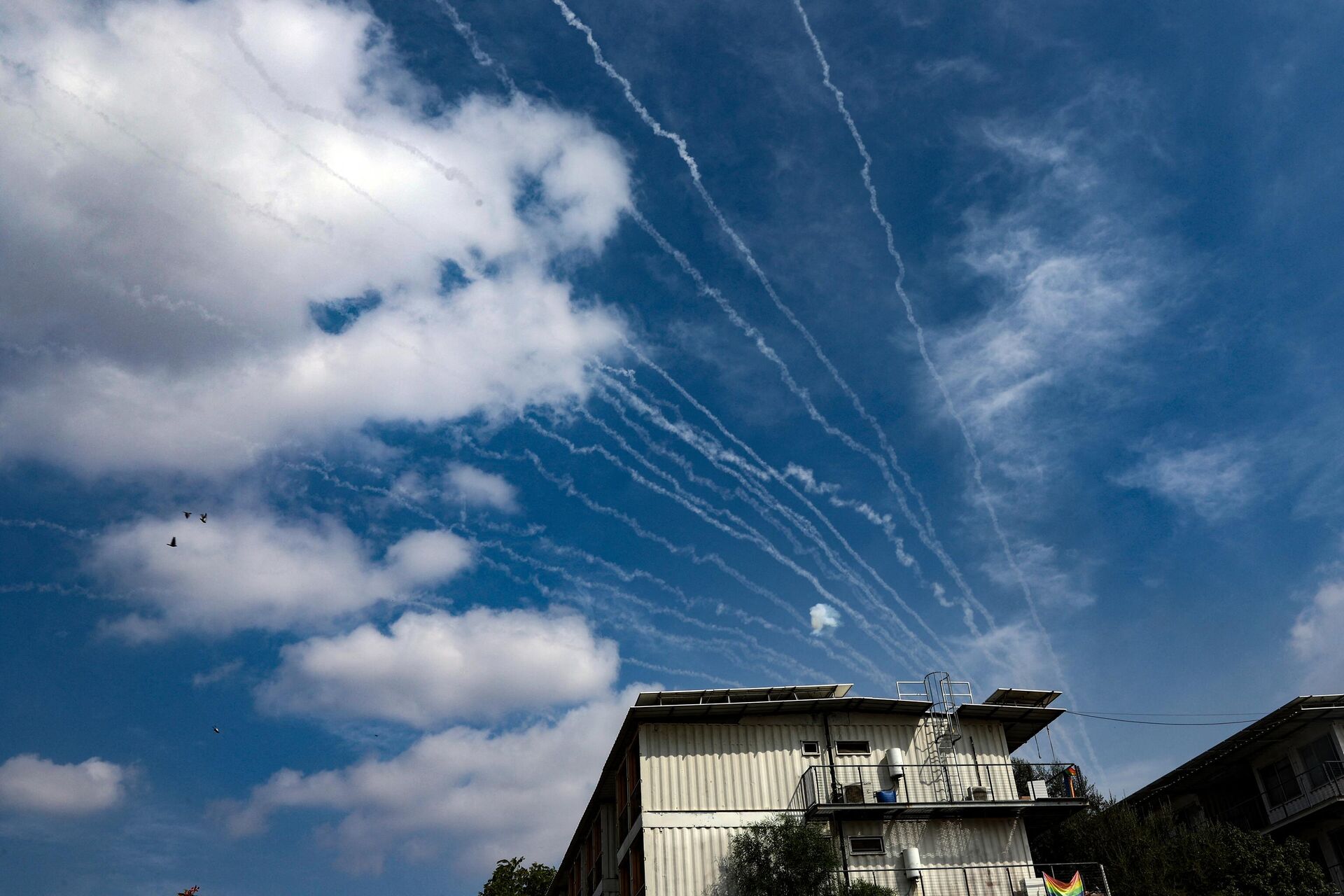 Rockets fired by Palestinian militants in the Gaza Strip iare intercepted by Israel's Iron Dome defence missile system over Sderot on October 8, 2023. - Sputnik India, 1920, 10.10.2023