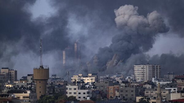 Smoke rises following an Israeli airstrike in Gaza City - Sputnik भारत
