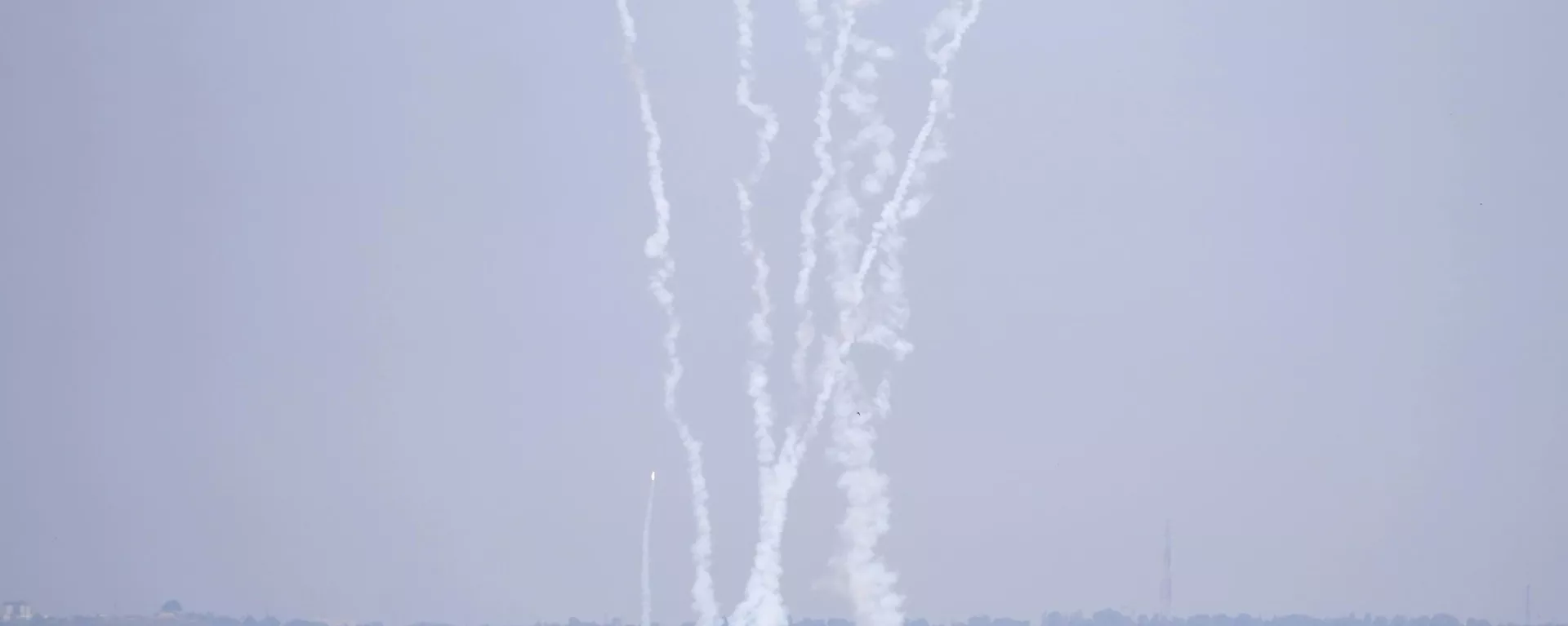 Rockets are launched from the Gaza Strip towards Israel, on Gaza City, Wednesday, May 10, 2023.  - Sputnik भारत, 1920, 14.10.2023