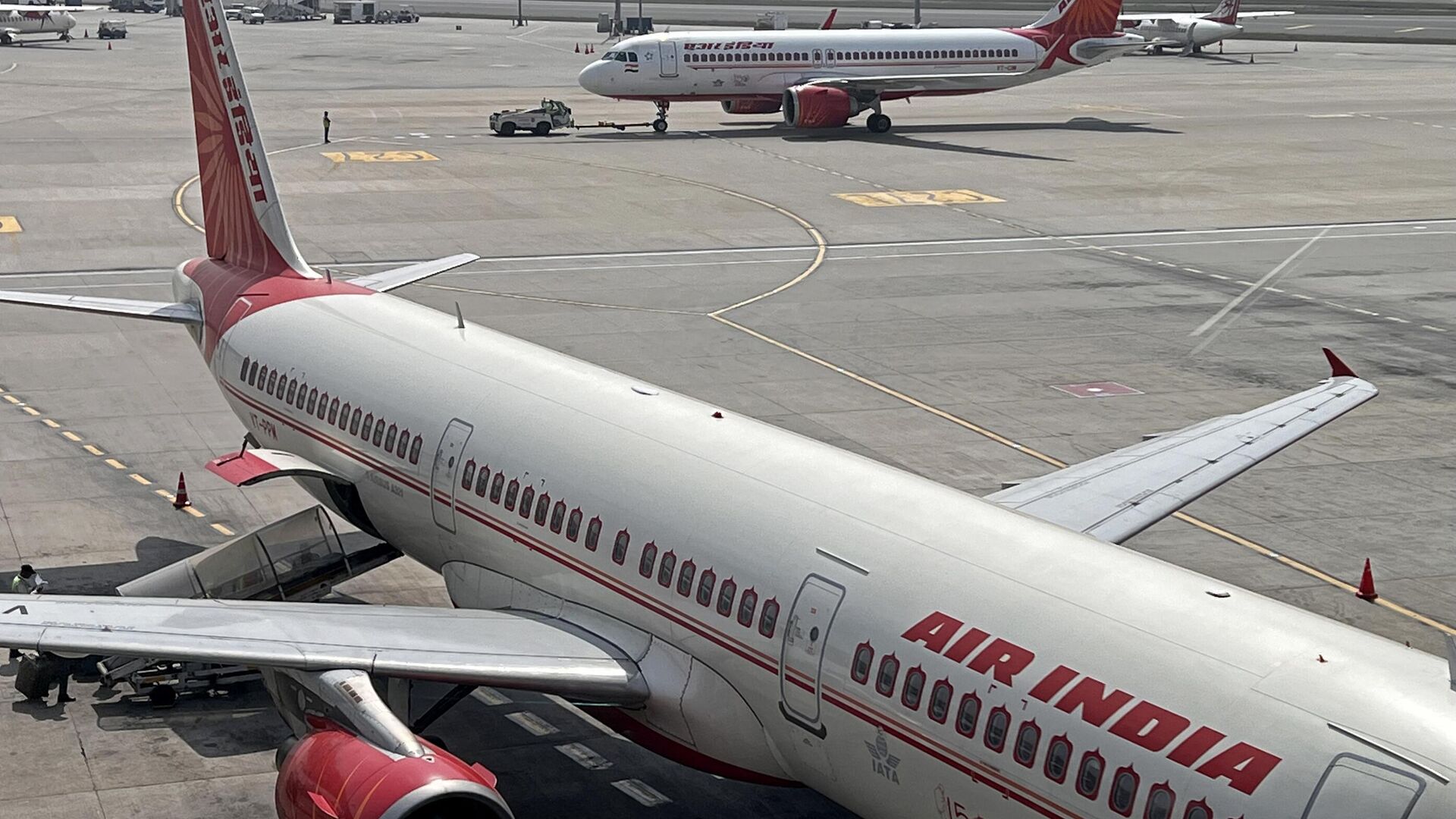 Air India aircrafts stand on the tarmac at the Indira Gandhi International Airport in New Delhi on February 28, 2023. - Sputnik भारत, 1920, 31.10.2023