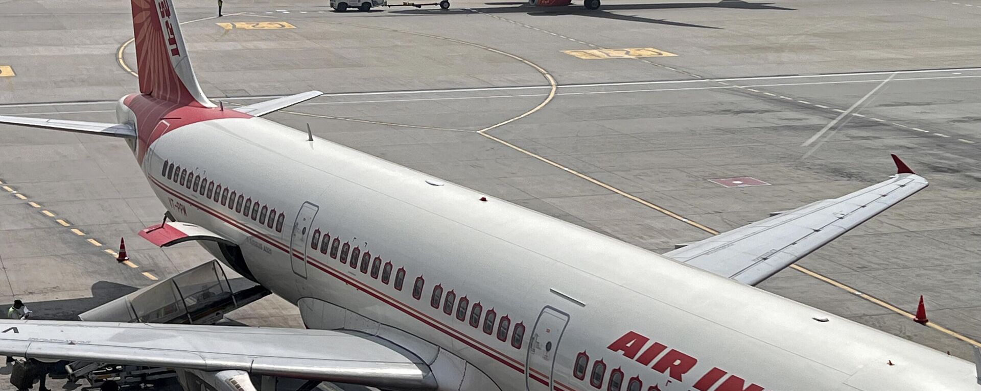 Air India aircrafts stand on the tarmac at the Indira Gandhi International Airport in New Delhi on February 28, 2023. - Sputnik India, 1920, 15.10.2023