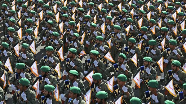 Iran's paramilitary Revolutionary Guard troops march during a military parade commemorating the anniversary of the start of the 1980-88 Iraq-Iran war, in front of the shrine of the late revolutionary founder Ayatollah Khomeini, just outside Tehran, Iran, Thursday, Sept. 22, 2022 - Sputnik भारत