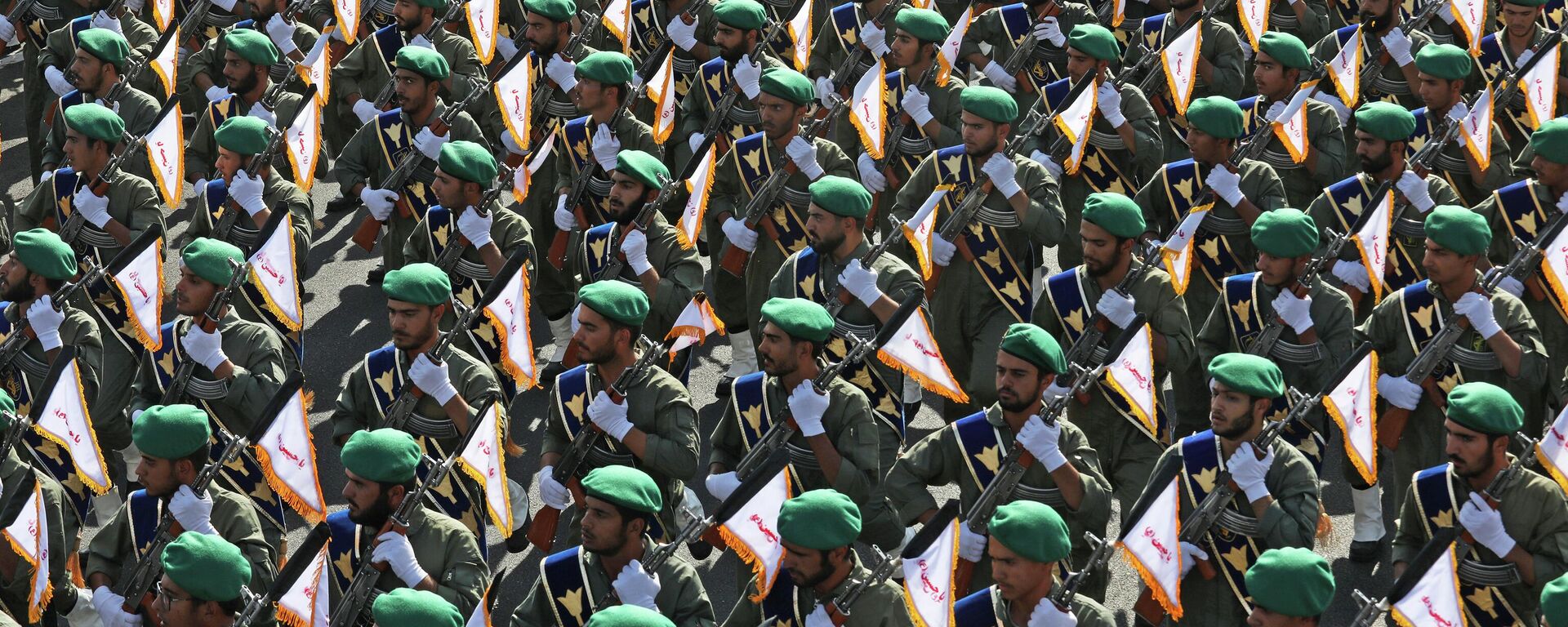 Iran's paramilitary Revolutionary Guard troops march during a military parade commemorating the anniversary of the start of the 1980-88 Iraq-Iran war, in front of the shrine of the late revolutionary founder Ayatollah Khomeini, just outside Tehran, Iran, Thursday, Sept. 22, 2022 - Sputnik भारत, 1920, 17.10.2023