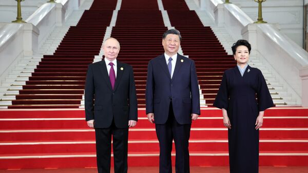 Russian President Vladimir Putin at a ceremony to welcome Chinese President Xi Jinping and his wife Peng Liyuan in Beijing - Sputnik India