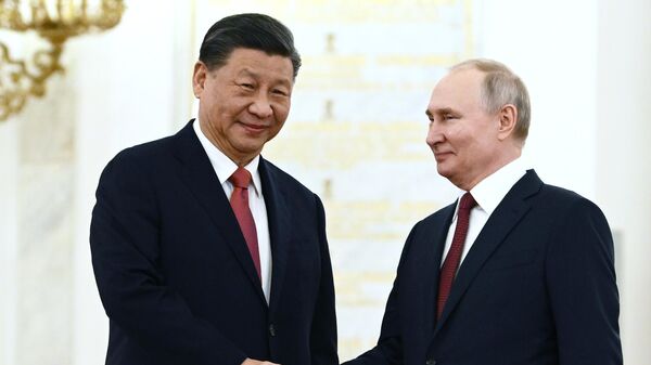 Russian President Vladimir Putin's meeting with Chinese counterpart Xi Jinping in Moscow. File photo - Sputnik India
