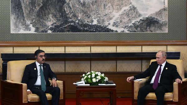 In Beijing, President Vladimir Putin held a meeting with Acting Prime Minister of Pakistan Anwar-ul-Haq Kakar - Sputnik India